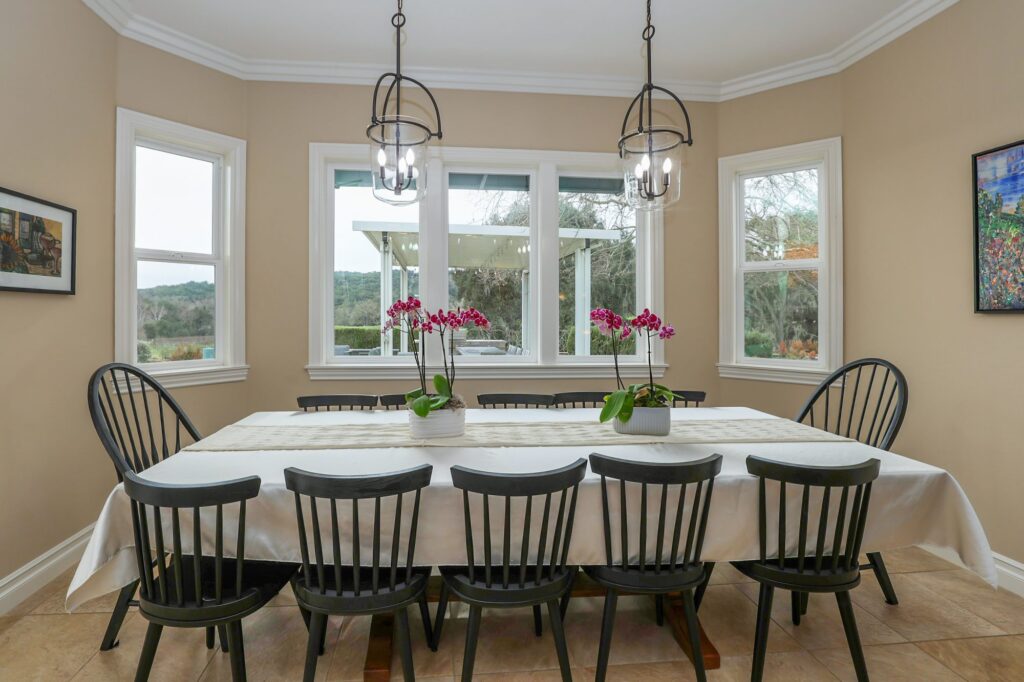 The dining room, bay window to the vines