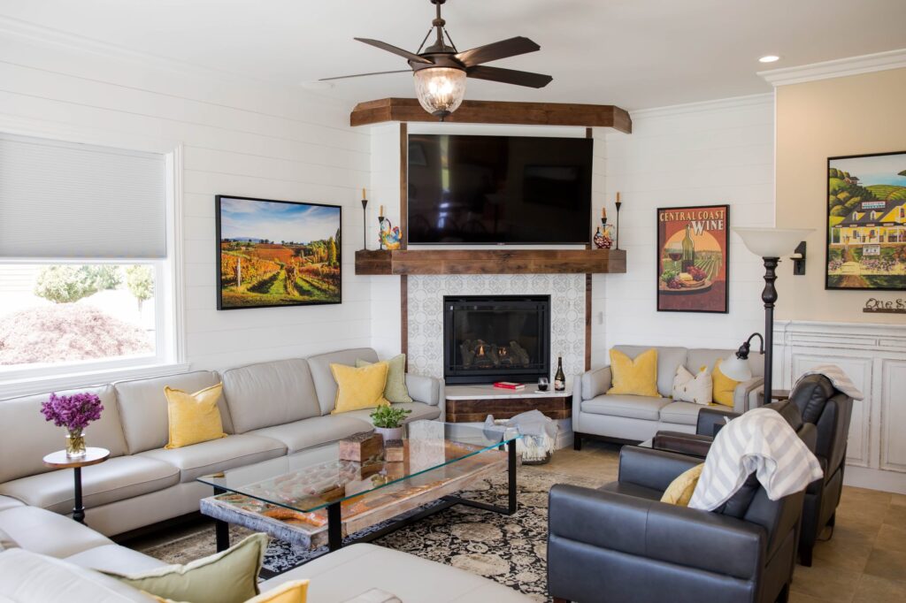 The living room, with fireplace and vineyard views